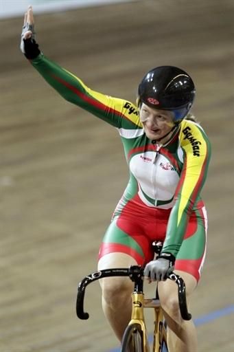 Olga Panarina from Belarus celebrates after winning the 500 metre time trial final