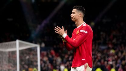 Cristiano Ronaldo applauds the Man Utd fans after the loss against Atletico Madrid 