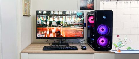 Acer Predator Orion 7000 (2023) review unit on desk playing Cyberpunk 2077