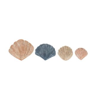 Four different colored sea shell trinket trays - two coral pink, one navy blue, and one sandy beige