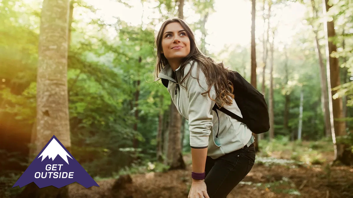 a photo of a woman hiking