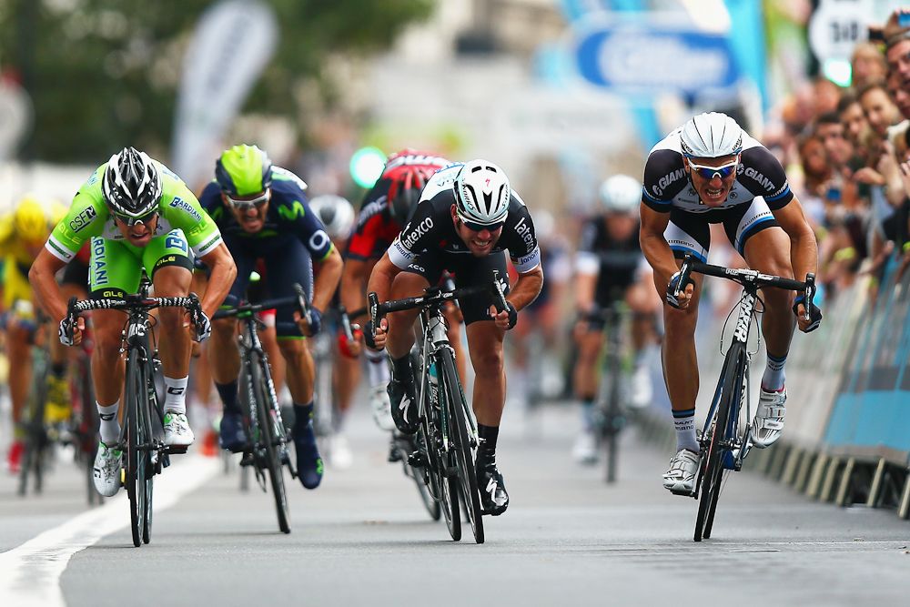 Mark Cavendish of Great Britain and Omega Pharma-QuickStep sprints against Marcel Kittel of Germany and the Giant-Shimano Team during the final stage of the 2014 Tour of Britain.