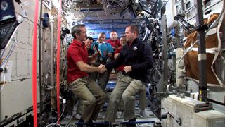 Hadfield Takes Command of the ISS