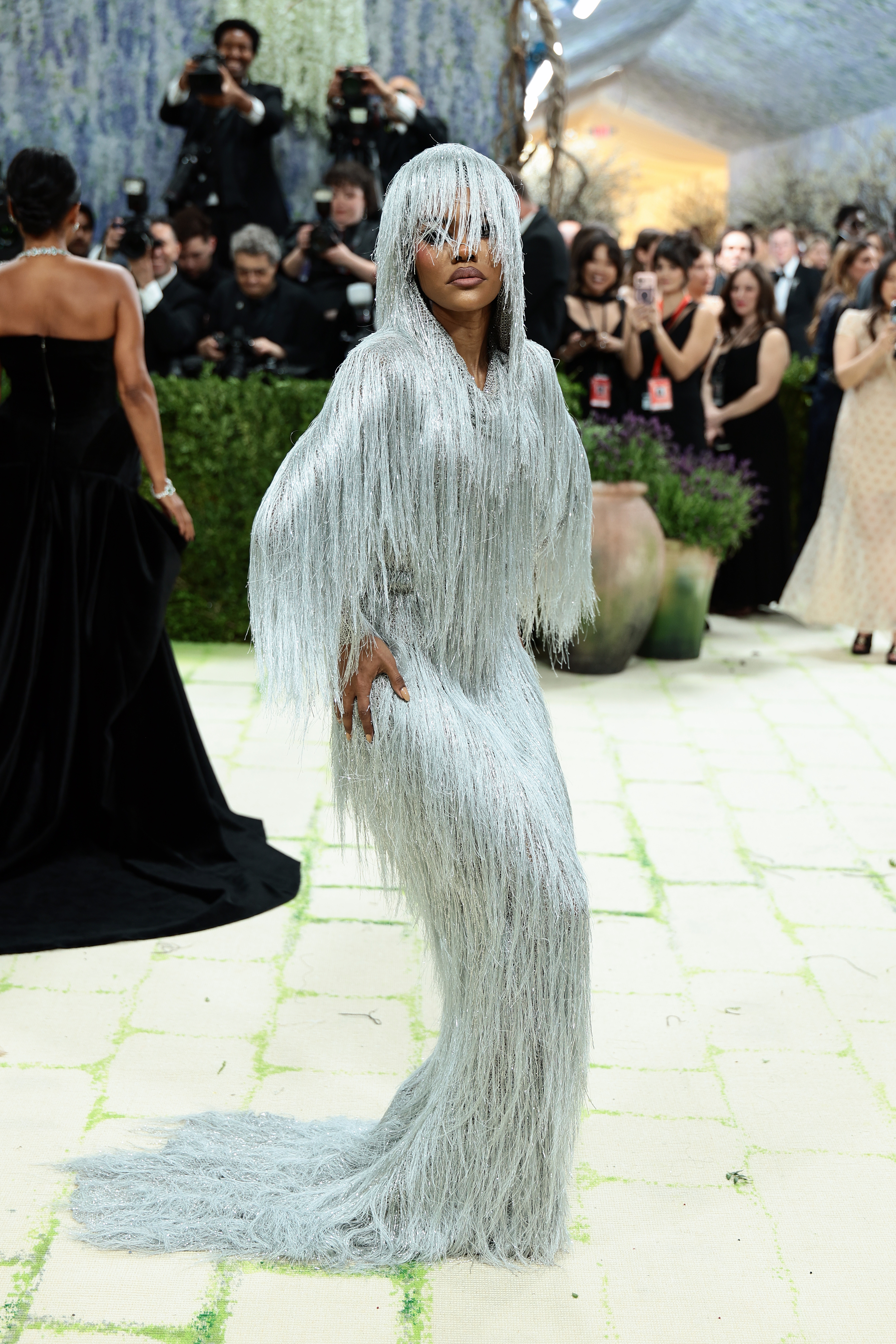Teyana Taylor on the 2026 Met Gala red carpet wearing a fringe dress
