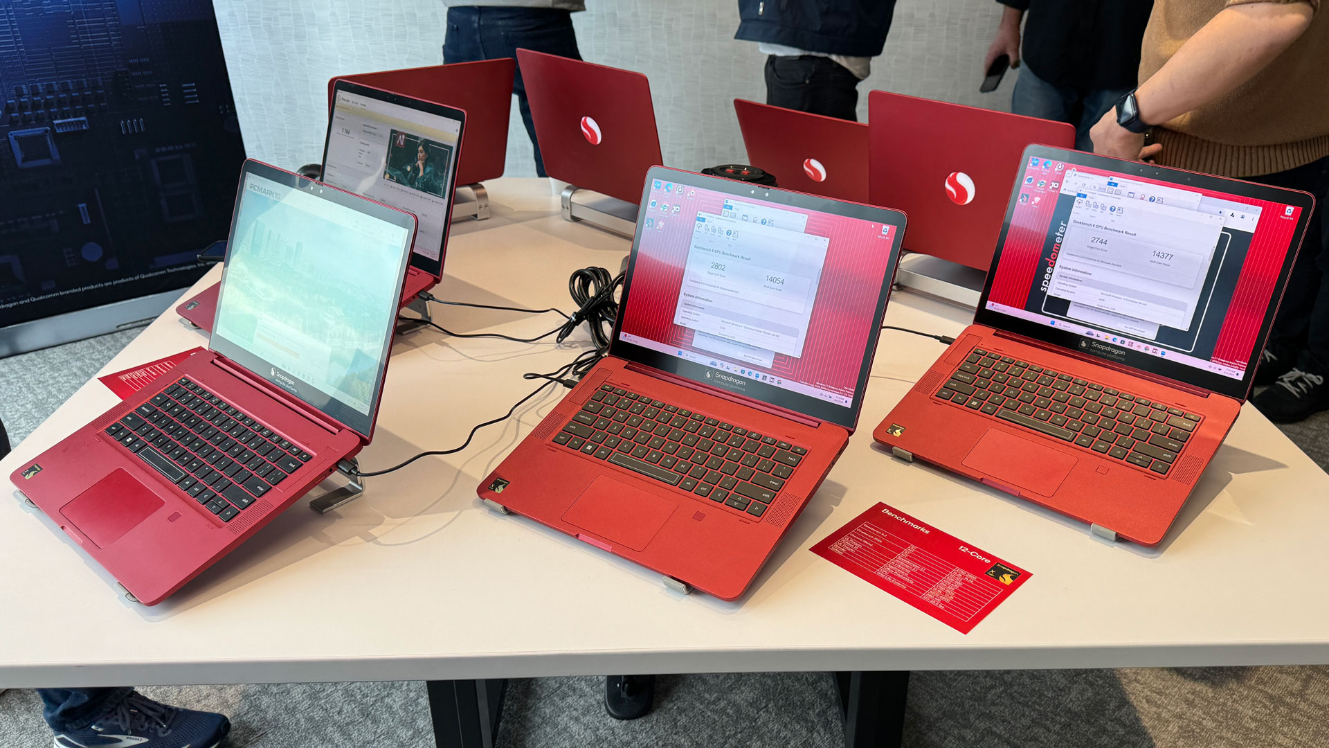 Red reference laptops with Qualcomm Snapdragon X Elite.