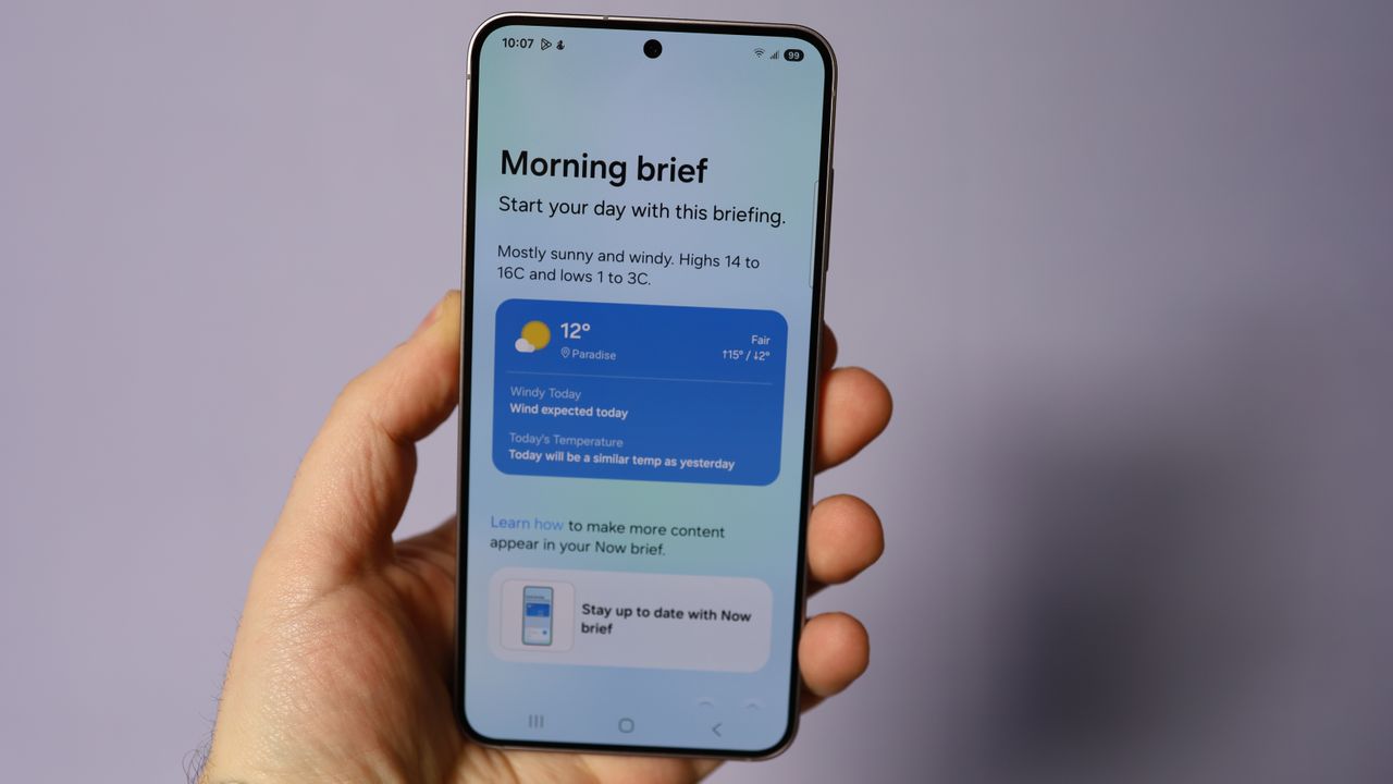 Samsung Galaxy S25 in hand, Now Brief app