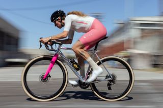 MAAP x Bleach Design Werks kit worn by female cyclist