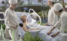 An elderly man in a hospital bed outdoors