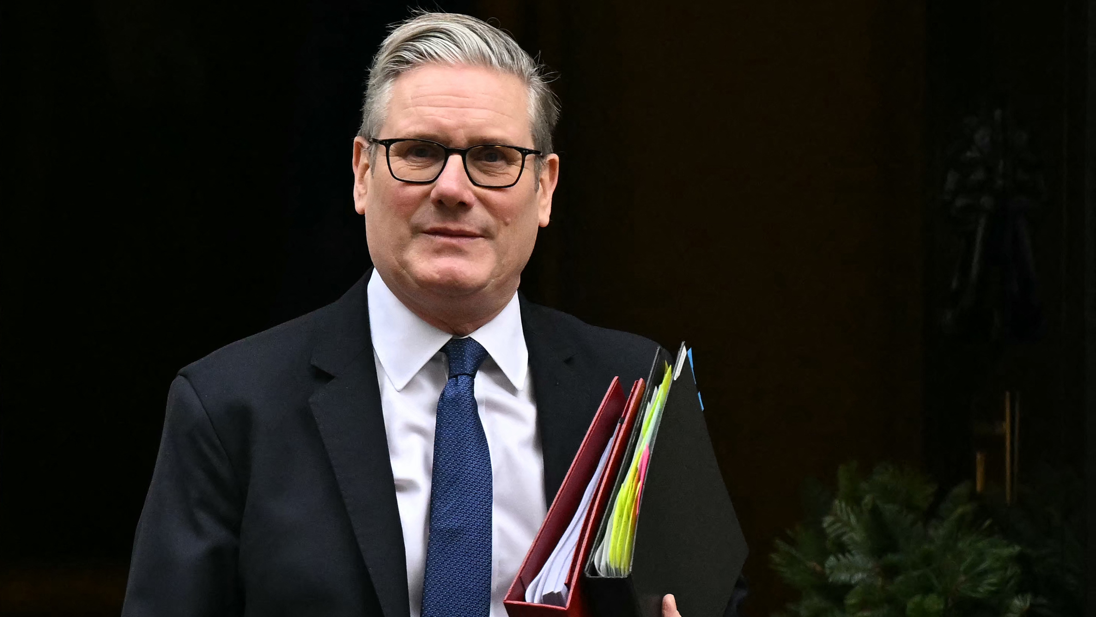 TOPSHOT - Britain&#039;s Prime Minister Keir Starmer leaves 10 Downing Street in central London on December 10, 2025, to take part in the weekly session of Prime Minister&#039;s Questions (PMQs). (Photo by Ben STANSALL / AFP via Getty Images)