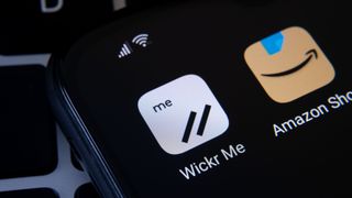 The Wickr Me app logo on an iPhone home screen.
