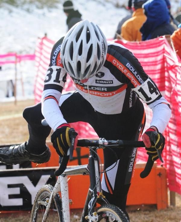Peter Webber (Boulder Cycle Sports) re-mounting his bike at the barriers