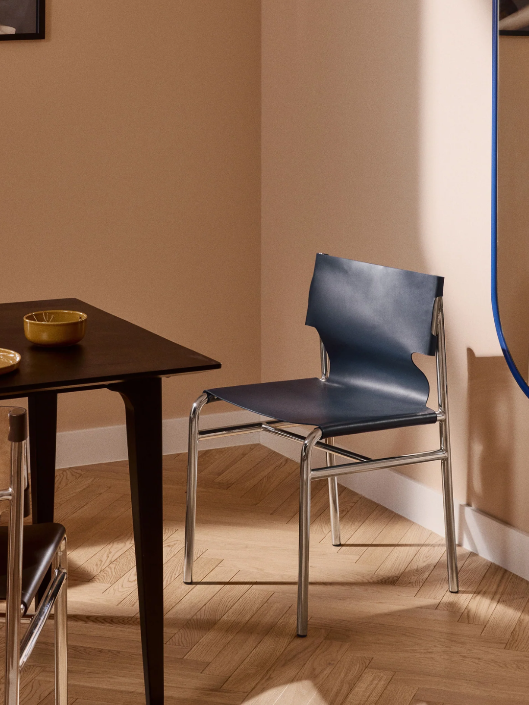 A steel and leather dining chair
