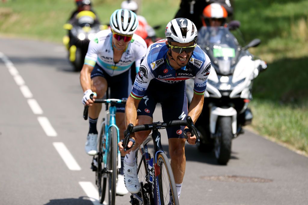 SAINTGERVAIS MONTBLANC FRANCE JULY 16 LR Alexey Lutsenko of Kazakhstan and Astana Qazaqstan Team and Julian Alaphilippe of France and Team Soudal Quick Step compete in the breakaway during the stage fifteen of the 110th Tour de France 2023 a 179km stage from Les Gets les Portes du Soleil to SaintGervais MontBlanc 1379m UCIWT on July 16 2023 in SaintGervais MontBlanc France Photo by Michael SteeleGetty Images