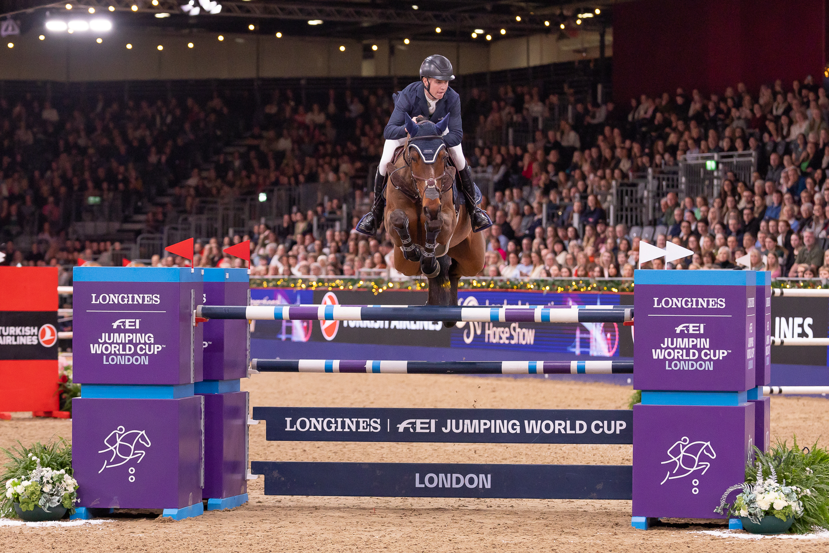 Tom Wachman and Do It Easy winning the Turkish Airlines grand prix at the London International Horse Show in 2025.