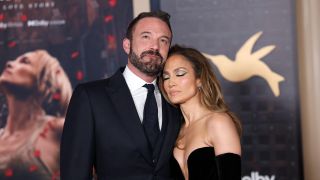 JLo and Ben Affleck cuddling on the red carpet of This Is Me... Now: A Love Story