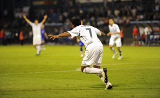 Theo Walcott celebrates after scoring for England against Croatia in September 2008.