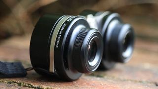 The Vixen SG 2.1x42 wide-field binoculars on a stone slab