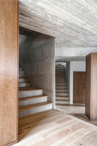 The staircases lead up to the two first floor bedrooms