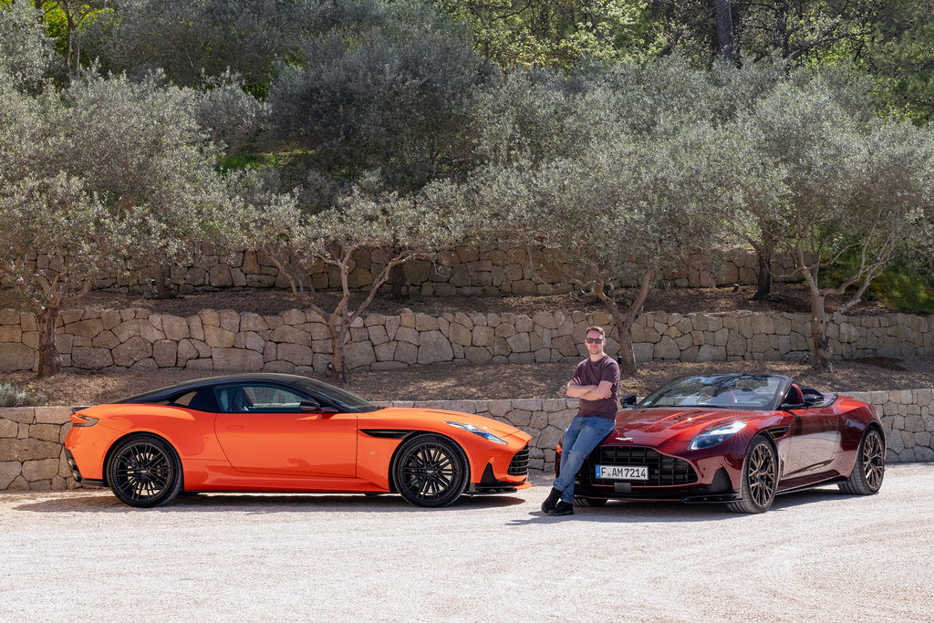 two aston martin DB12 S, one a volante, parked next to each other