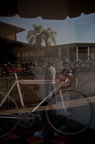 A retro bike sits on display as the race goes by.