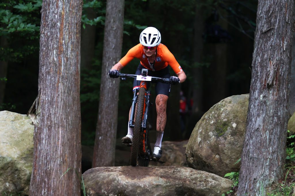 IZU JAPAN JULY 27 Anne Terpstra of Team Netherlands jumps off a boulder during the Womens Crosscountry race on day four of the Tokyo 2020 Olympic Games at Izu Mountain Bike Course on July 27 2021 in Izu Shizuoka Japan Photo by Michael SteeleGetty Images