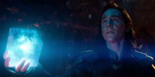 Loki handing the tesseract to Thanos