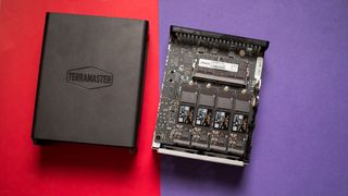 TerraMaster F8 SSD Plus internals next to external casing