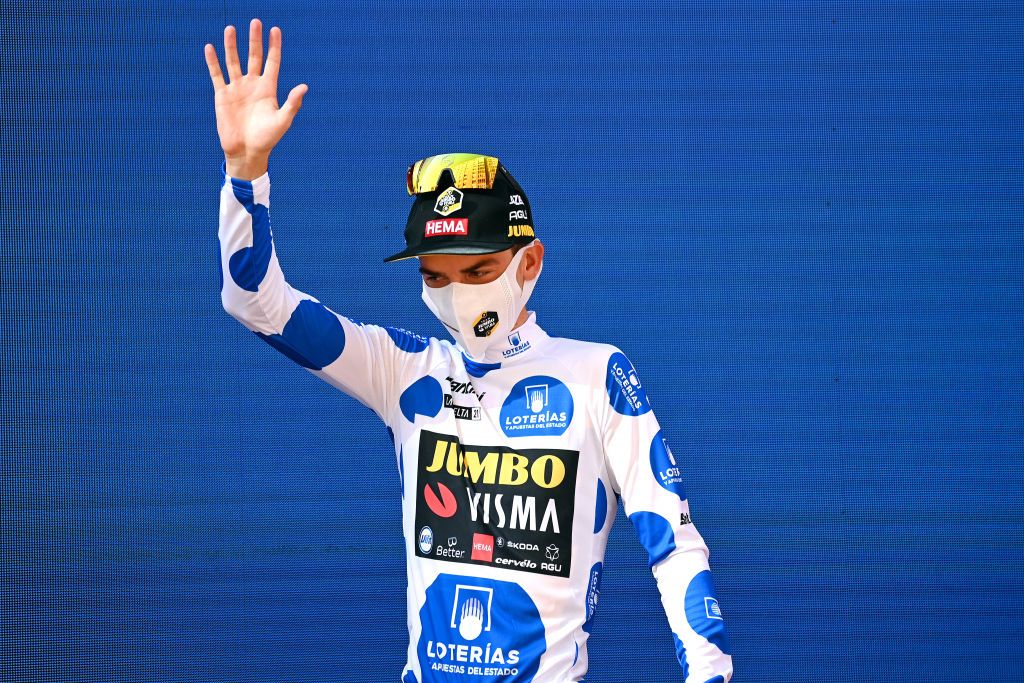 BURGOS SPAIN AUGUST 15 Sepp Kuss of United States and Team Jumbo Visma celebrates winning the Polka Dot Mountain Jersey on the podium ceremony after the 76th Tour of Spain 2021 Stage 2 a 1667km stage from Caleruega Monasterio de Santo Domingo de Guzmn to Burgos Gamonal lavuelta LaVuelta21 CapitalMundialdelCiclismo on August 15 2021 in Burgos Spain Photo by Stuart FranklinGetty Images