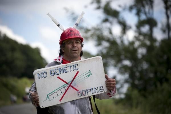 A fan protests against doping at the Tour de France stage 8
