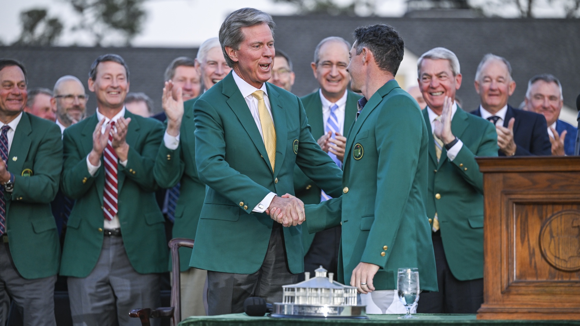 Rory McIlroy being congratulated by Augusta National Chairman Fred Ridley after the 2025 Masters