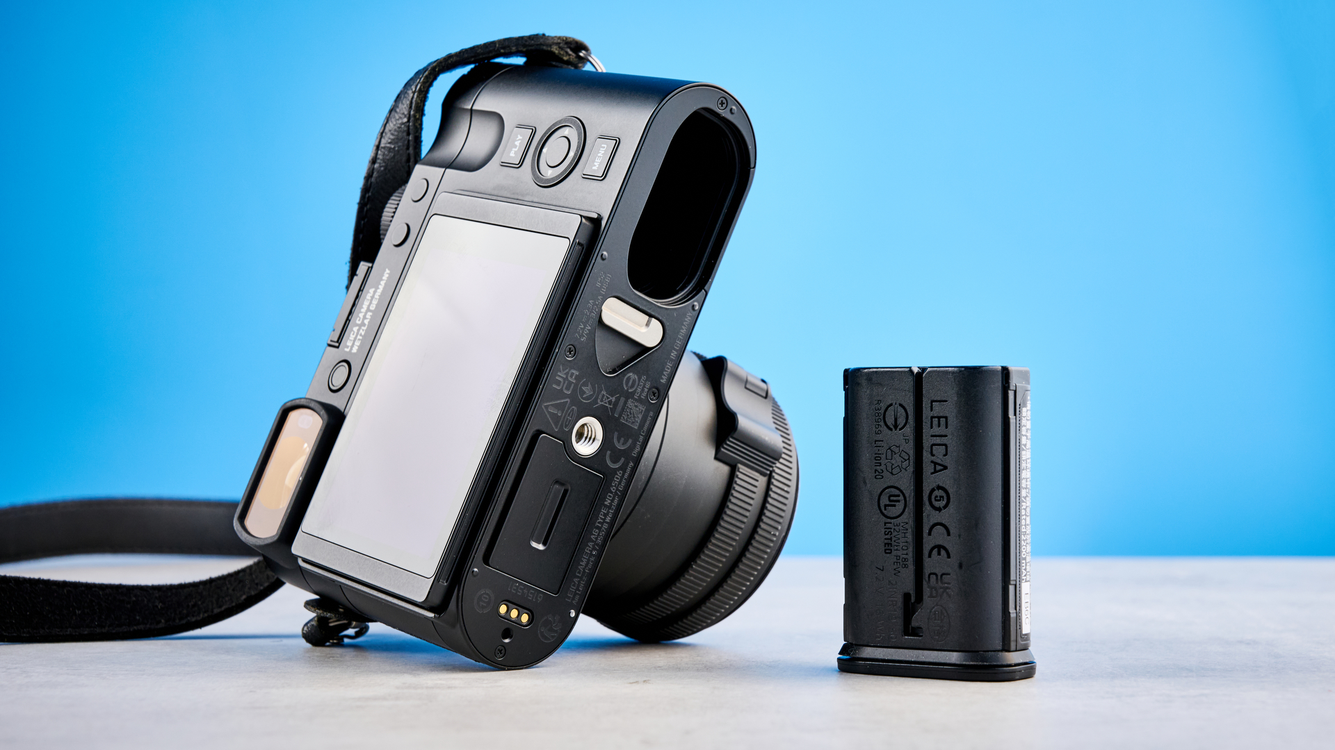 A black Leica Q3 Monochrom black-and-white mirrorless camera