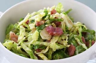 Brussels sprout chiffonade with bacon, garlic and shallots