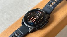 A close-up side view of the Garmin Fenix 8 with the default watch face