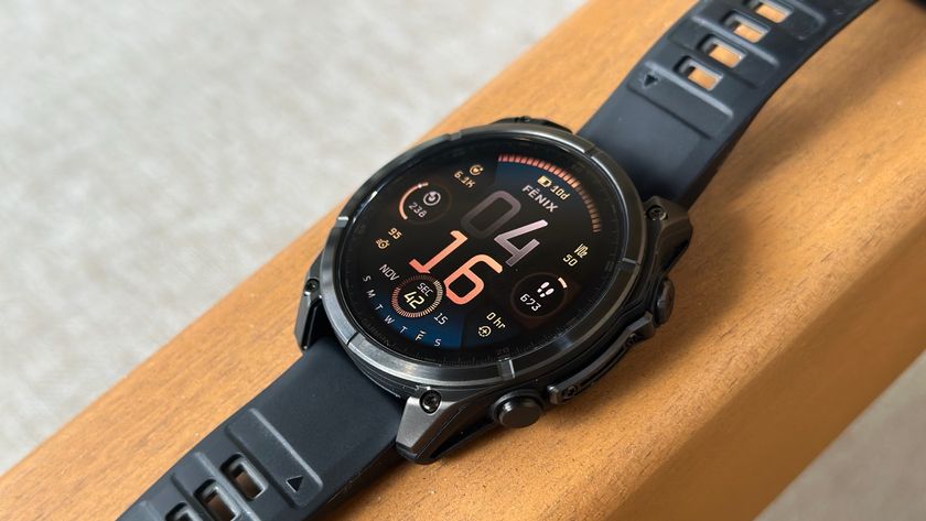 A close-up side view of the Garmin Fenix 8 with the default watch face