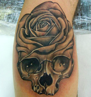 Skull and rose tattoo