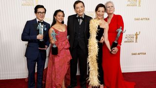 Ke Huy Quan, Stephanie Hsu, James Hong, Michelle Yeoh, and Jamie Lee Curtis, recipients of the Outstanding Performance by a Cast in a Motion Picture award for "Everything Everywhere All at Once," pose in the press room during the 29th Annual Screen Actors Guild Awards at Fairmont Century Plaza on February 26, 2023 in Los Angeles, California.