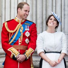 Prince William, Princess Eugenie and Princess Beatrice smile together on the Buckingham Palace balcony