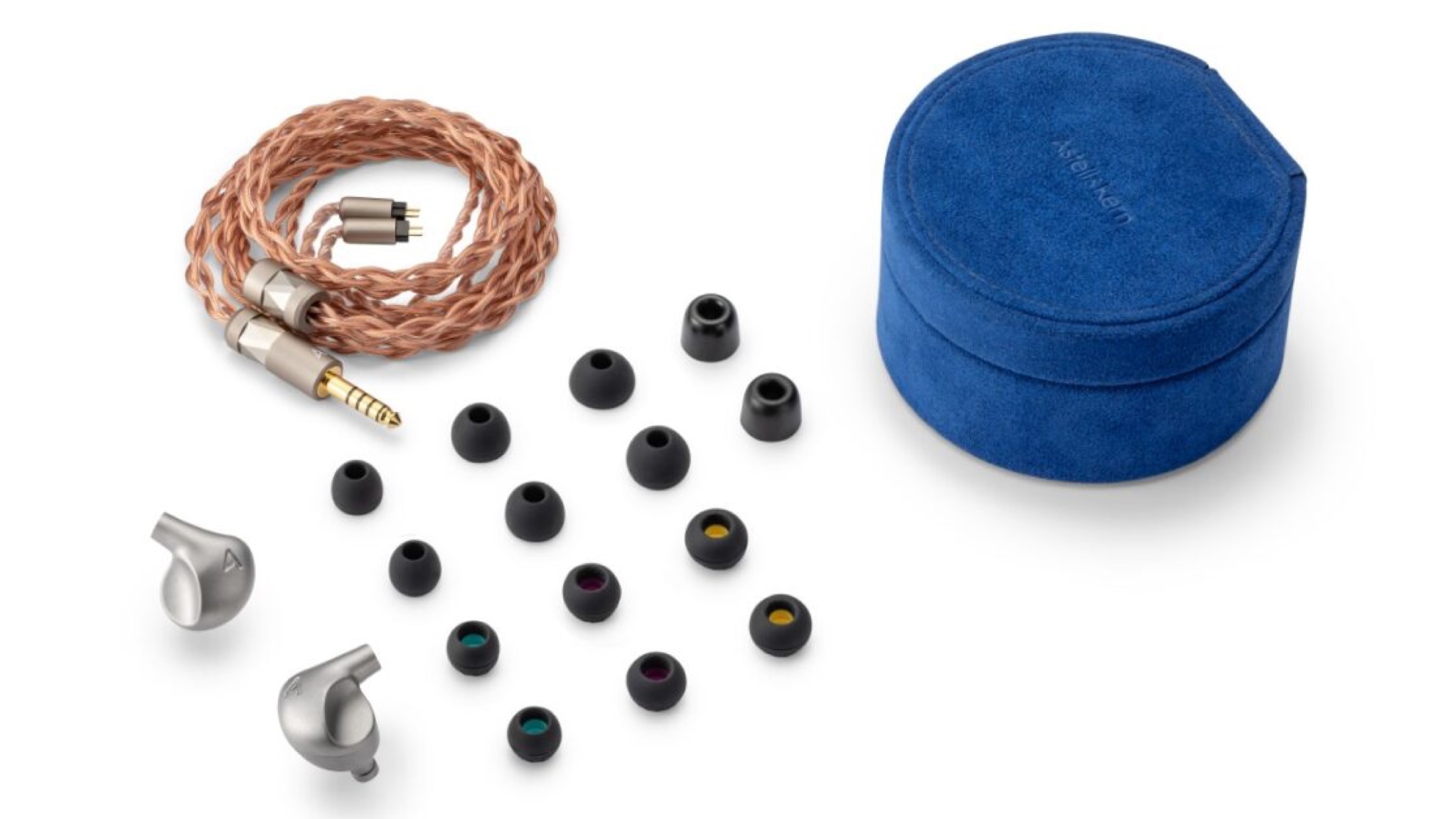 Astell & Kern Luna IEMs with a blue case, copper coloured cables and the ear tips on a white surface