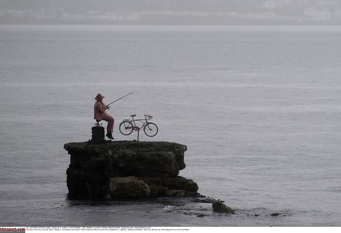 A local fisherman celebrates the Giro's passage