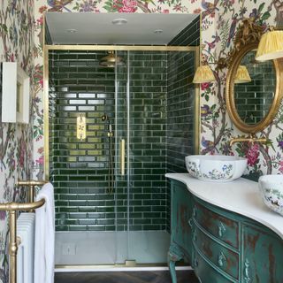 shower room with floral wallpaper and emerald tiles