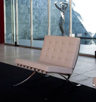 white barcelona chair by mies van der rohe