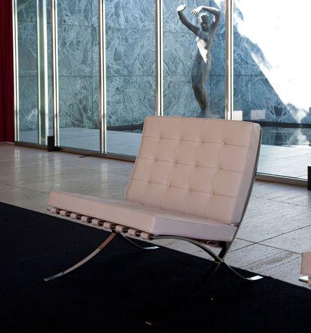 white barcelona chair by mies van der rohe