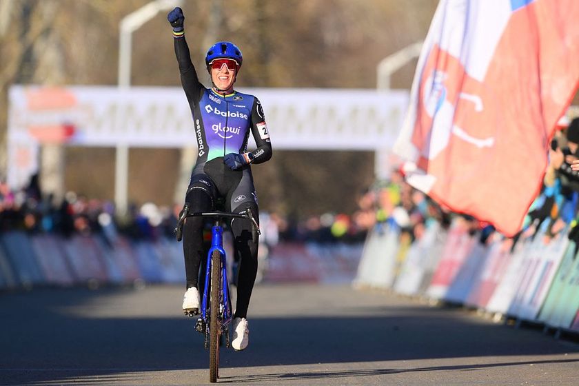 Dutch Lucinda Brand celebrates as she crosses the finish line to win the women elite race at the World Cup cyclocross cycling event in Tabor, Czech Republic, stage 1 (out of 12) of the UCI World Cup cyclocross competition, Sunday 23 November 2025.BELGA PHOTO DAVID PINTENS (Photo by DAVID PINTENS / BELGA MAG / Belga / AFP via Getty Images)