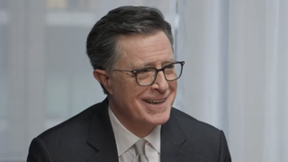 Stephen Colbert smiling while telling story during Strike Force Five reunion in May 2026