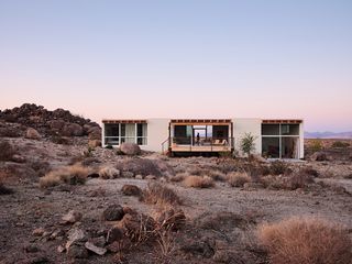 exterior from a distance at High Desert House by Ryan Leidner