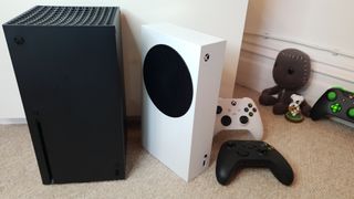 Xbox Series S with Xbox Series X and controllers