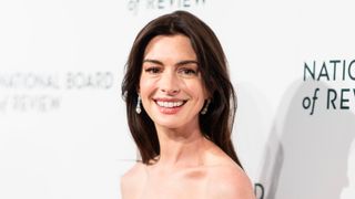 Anne Hathaway is pictured with face-framing layers whilst attending the 2024 National Board Of Review Gala at Cipriani 42nd Street on January 11, 2024 in New York City.