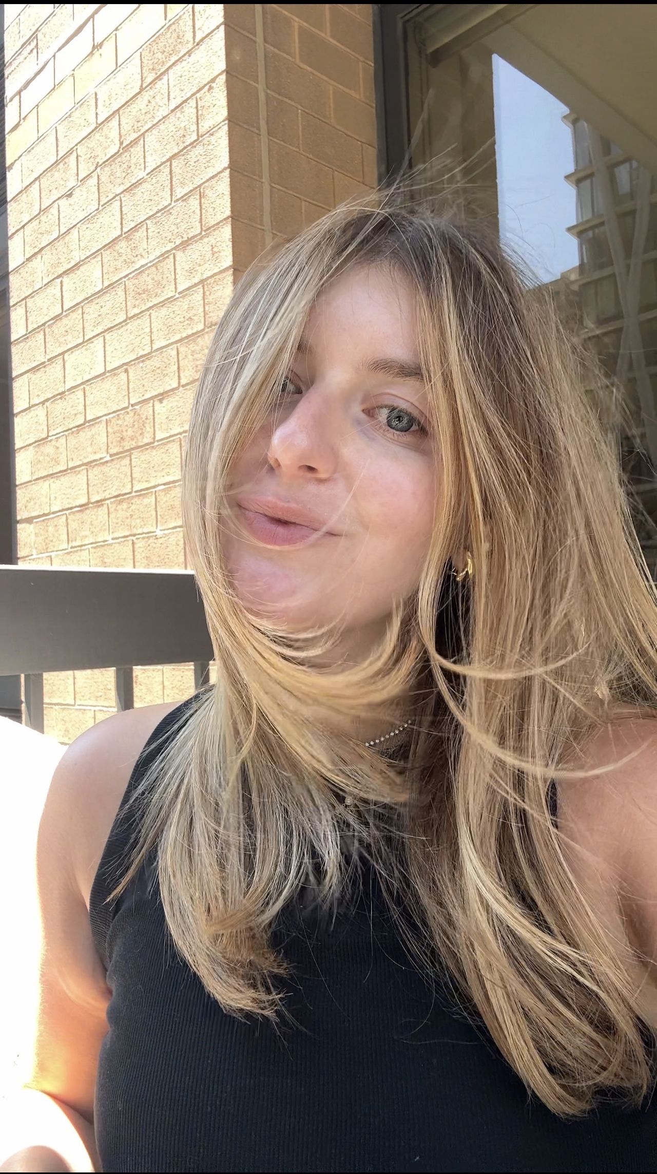 Samantha Holender before and after applying Tower's 28's foundation.