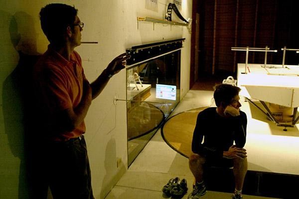 Steve Owens of Colorado Premier Training explains to Zabriskie the advantages of a low-speed wind tunnel.