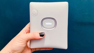 Fujifilm Instax Square Link held in hand